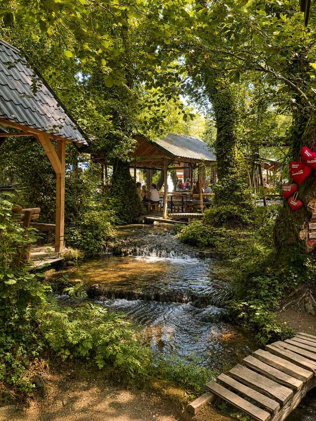 Wooden gazebos by the stream at the Janj islets, Konoba kod Dragane