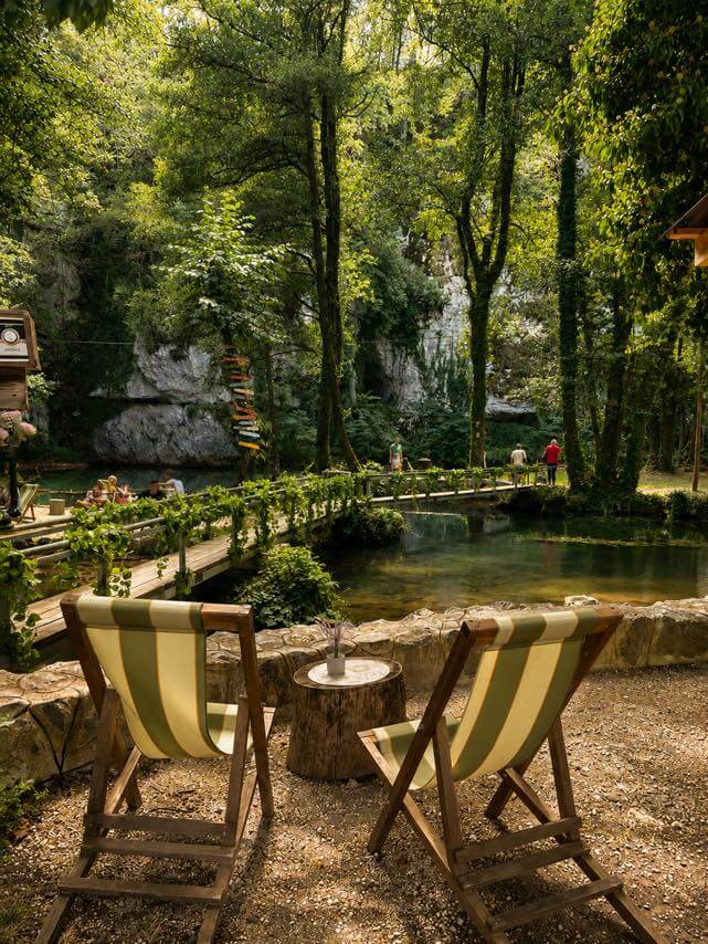 Deck chairs by the water at Raj na vodi cafe